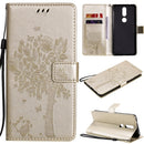 For Nokia 2.4 Tree & Cat Pattern Pressed Printing Horizontal Flip PU Leather Case with Holder & Card Slots & Wallet & Lanyard(Gold)