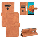 For LG K51 / Q51 Solid Color Skin Feel Magnetic Buckle Horizontal Flip Calf Texture PU Leather Case with Holder & Card Slots & Wallet(Brown)