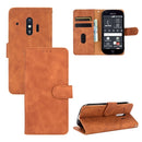 For Fujitsu F-42A / F-01L Solid Color Skin Feel Magnetic Buckle Horizontal Flip Calf Texture PU Leather Case with Holder & Card Slots & Wallet(Brown)