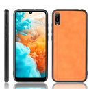 For Huawei Y6 Pro 2019 Shockproof Sewing Cow Pattern Skin PC + PU + TPU Case(Orange)