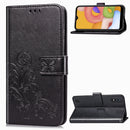 For Galaxy A01 Lucky Clover Pressed Flowers Pattern Leather Case with Holder & Card Slots & Wallet & Hand Strap(Black)